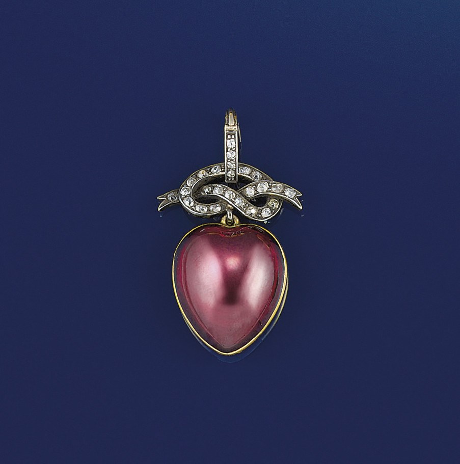 A Victorian, gold, foiled garnet and diamond pendant