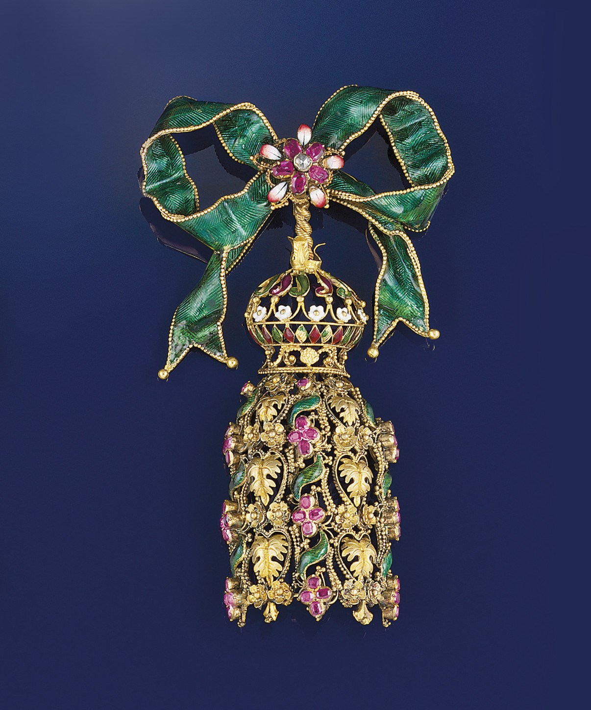 A mid 19th century gold, diamond, ruby and enamel brooch