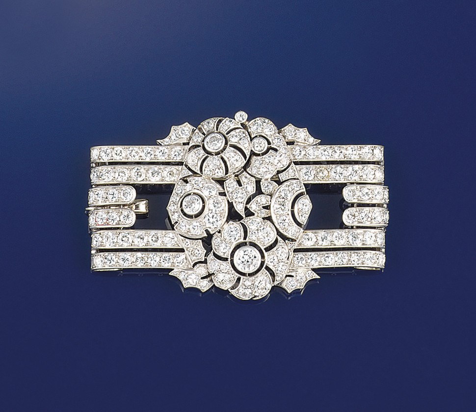 A diamond brooch/pendant