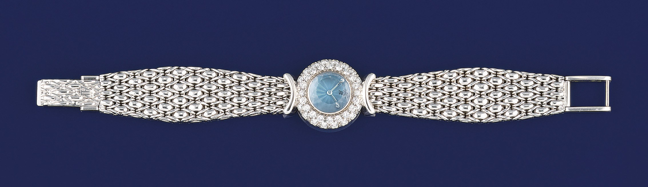A lady's 18ct. gold, diamond and blue topaz wristwatch, by Audemars Piguet
