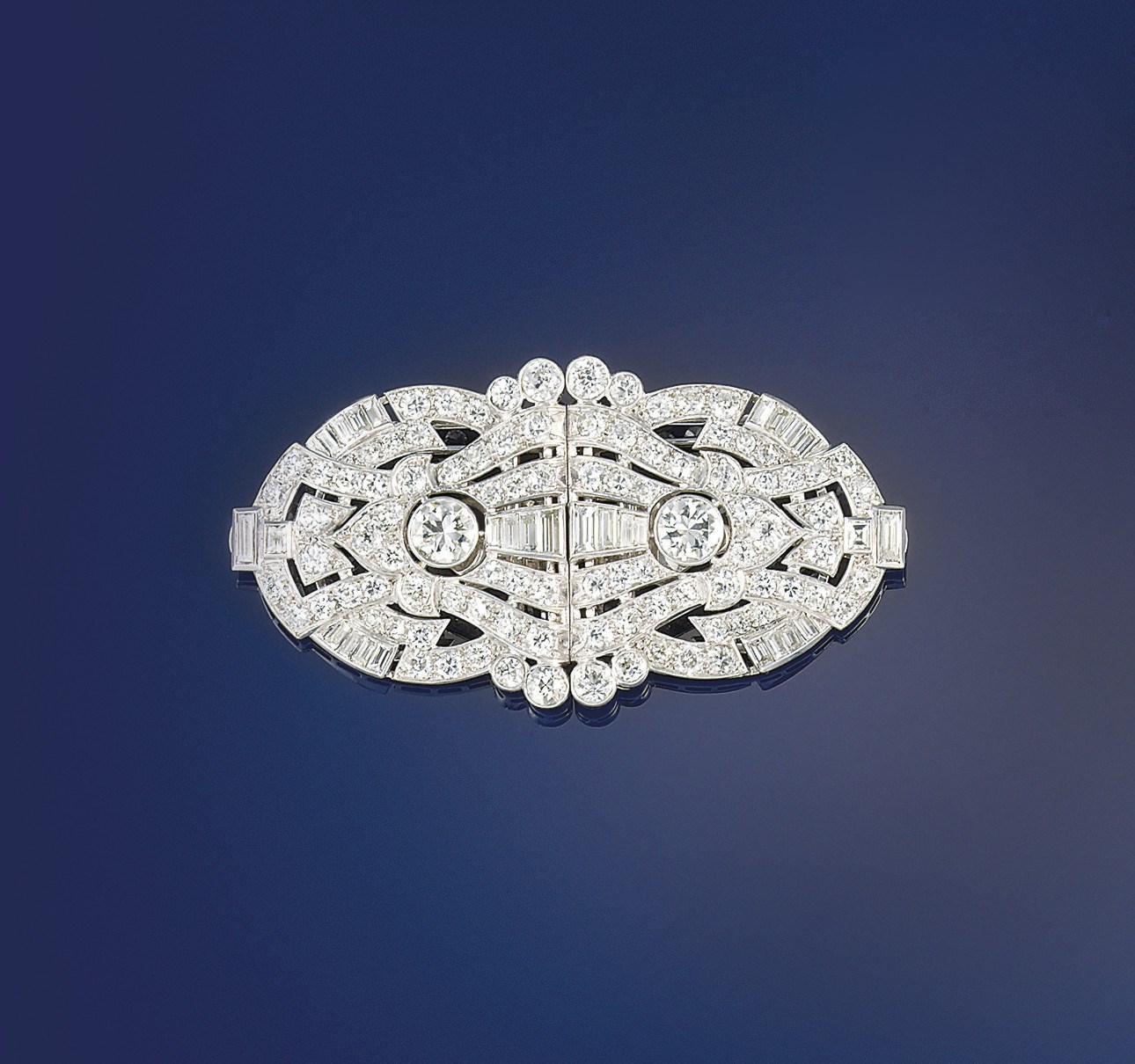 An Art Deco diamond double-clip brooch