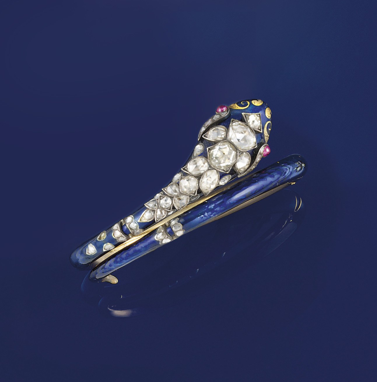 A 19th century gold, diamond and enamel serpent bangle