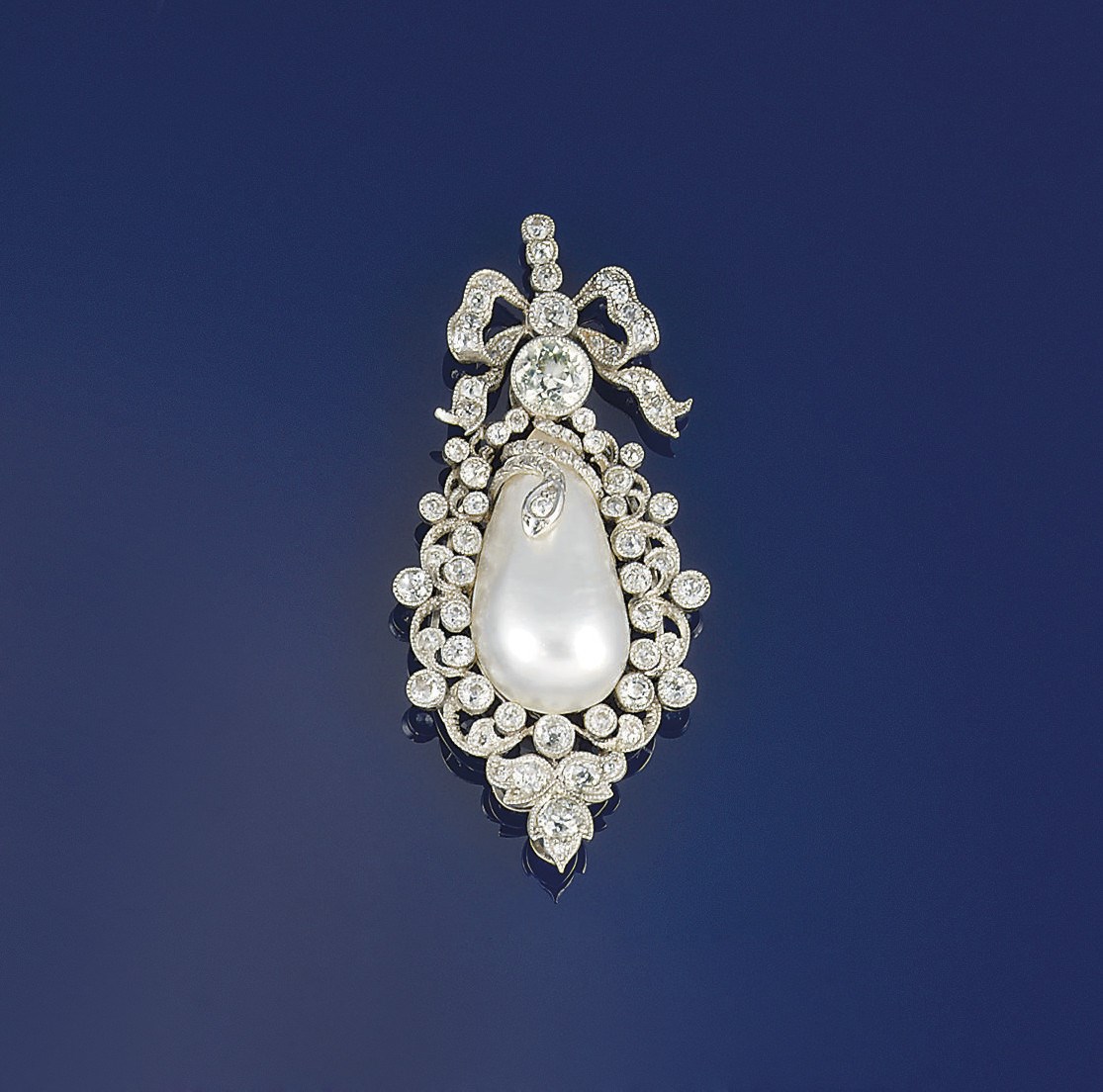 An Edwardian diamond and blister pearl pendant