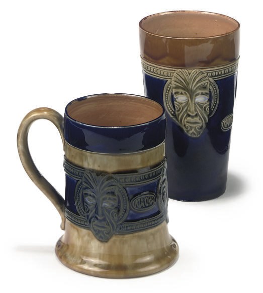 A ROYAL DOULTON STONEWARE BEAKER AND A SIMILAR TANKARD