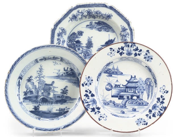 A DELFTWARE OCTAGONAL PLATE AND TWO ENGLISH DELFT PLATES