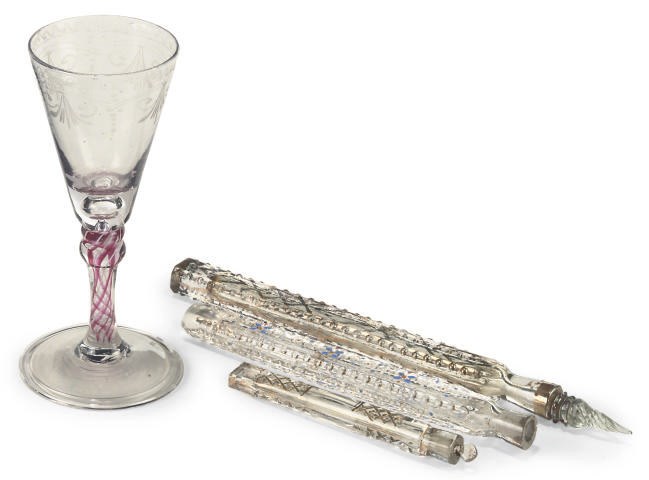 AN ENGRAVED COLOUR-TWIST WINE GLASS AND THREE SCENT BOTTLES