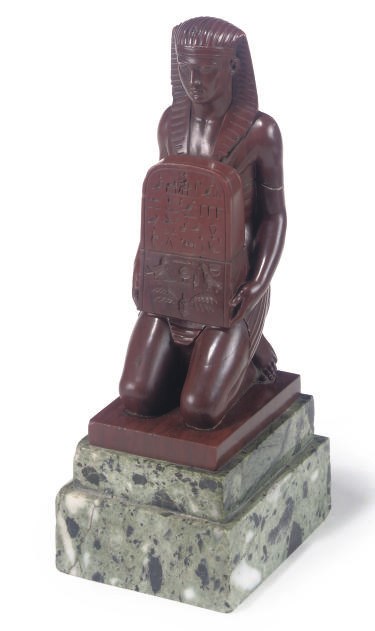 AN ITALIAN MARMO ROSSO FIGURE OF ANTINUOUS