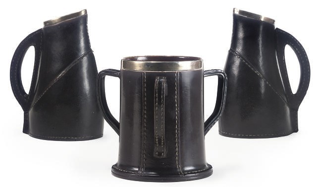 A PAIR OF DOULTON STONEWARE SILVER-MOUNTED JUGS AND A TYG