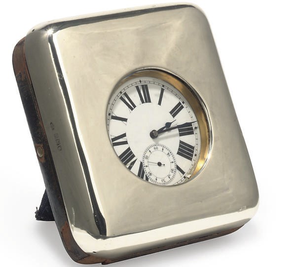 A SWISS NICKEL OPEN FACED POCKET WATCH IN SILVER AND LEATHER BOUND CASE