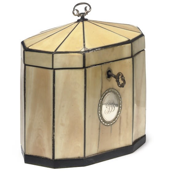 A GEORGE III SILVER-MOUNTED IVORY TEA CADDY