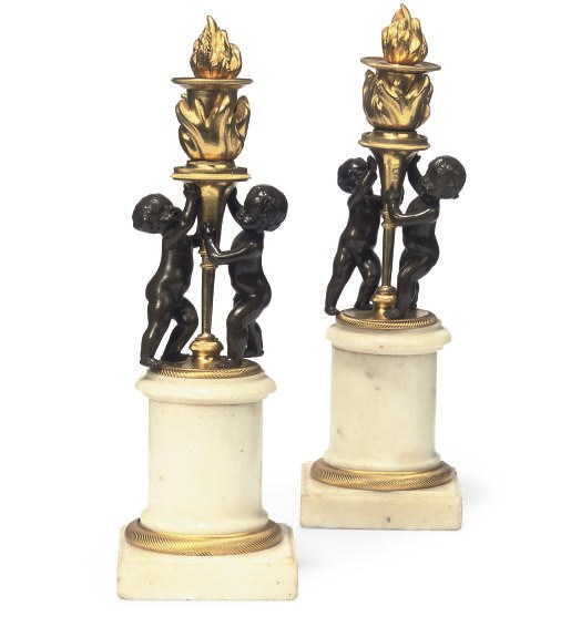 A PAIR OF FRENCH BRONZE AND GILT-BRONZE CANDLETICKS