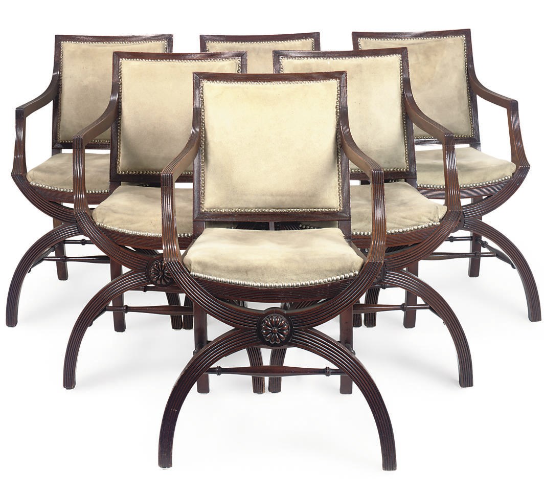 A SET OF SIX VICTORIAN MAHOGANY X-FRAME ARMCHAIRS