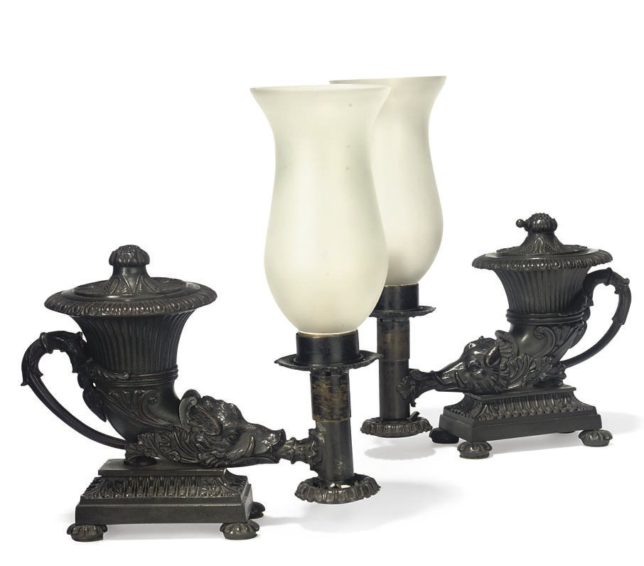A NEAR PAIR OF REGENCY BRONZE COLZA-OIL RHYTON LAMPS