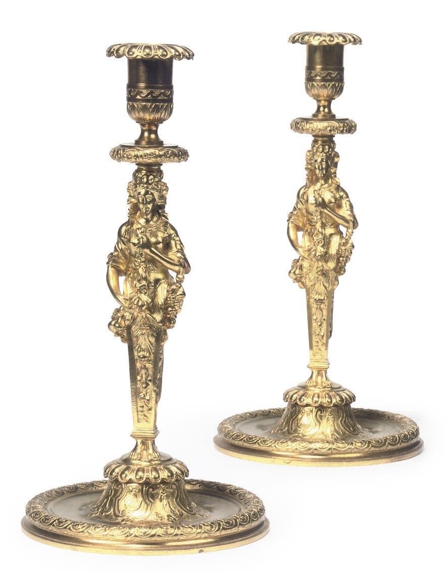 A PAIR OF GILT-BRONZE CANDLESTICKS