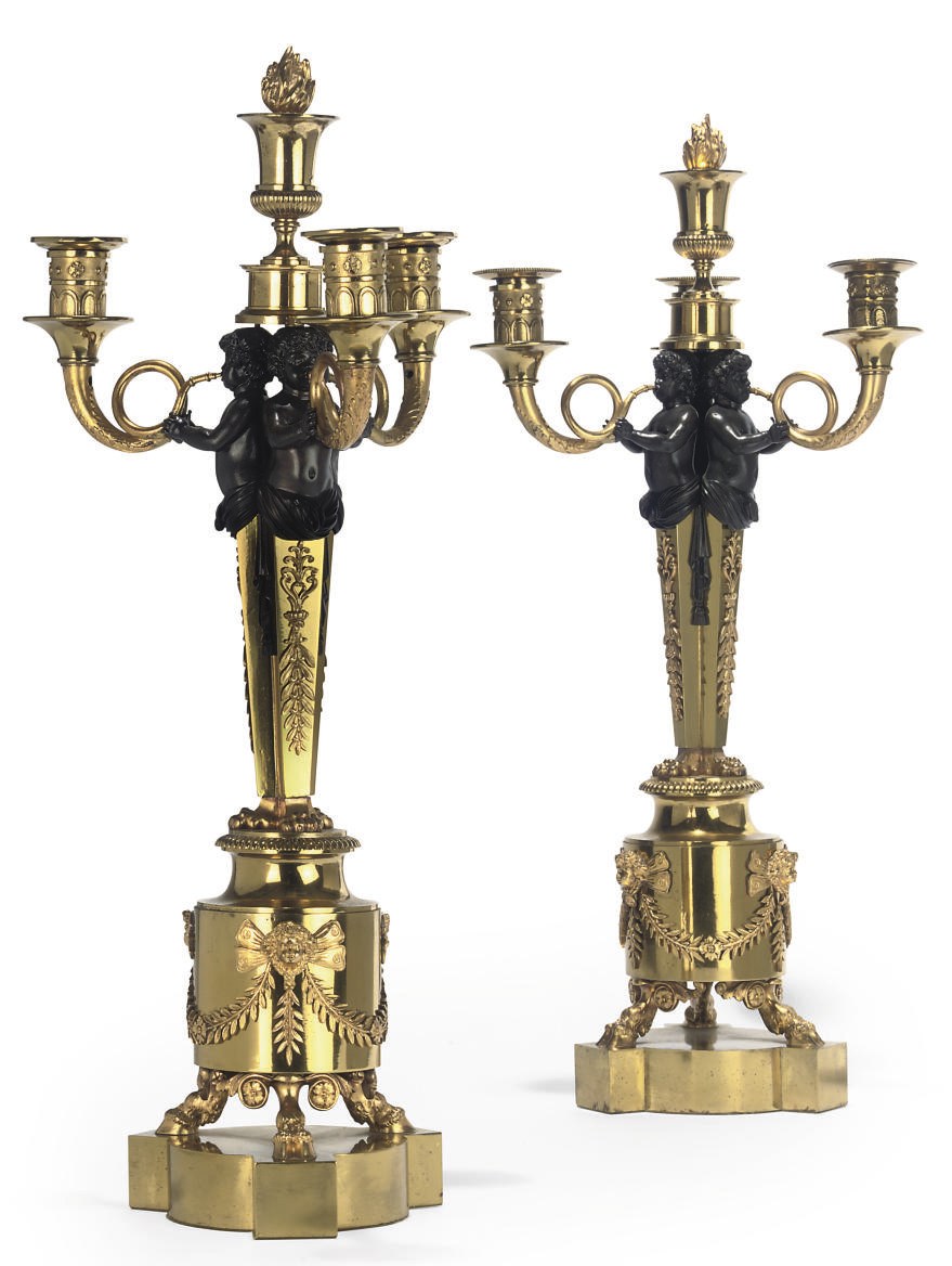A PAIR OF FRENCH BRONZE AND GILT-BRONZE MOUNTED FOUR-LIGHT CANDELABRA