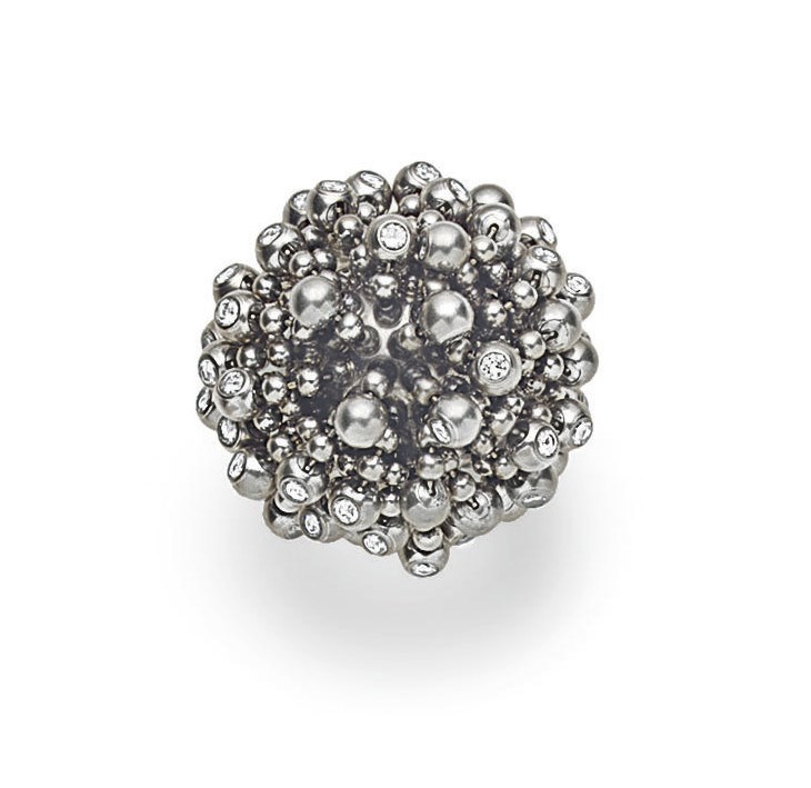 A DIAMOND AND WHITE GOLD "LA NOUVELLE VAGUE" RING, BY CARTIER