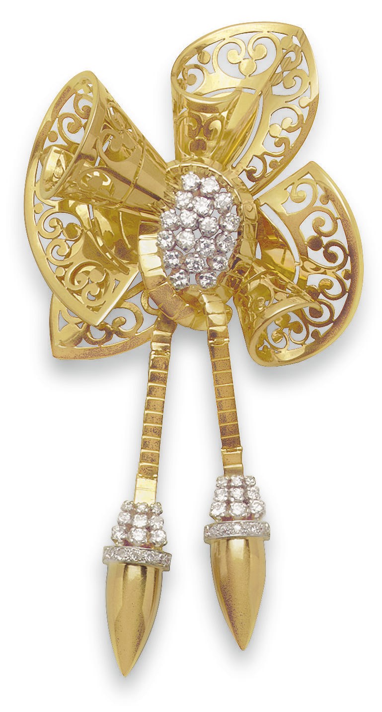 A RETRO DIAMOND AND GOLD BOW BROOCH