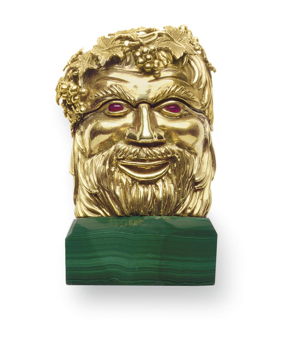 A MALACHITE AND GOLD "BACCHUS" LIGHTER, BY CARTIER
