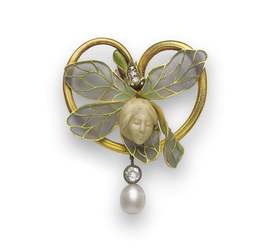 **AN ART NOUVEAU IVORY, DIAMOND AND ENAMEL BROOCH, BY HENRI VEVER