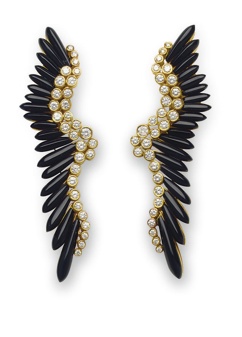 A PAIR OF ONYX AND DIAMOND EAR PENDANTS