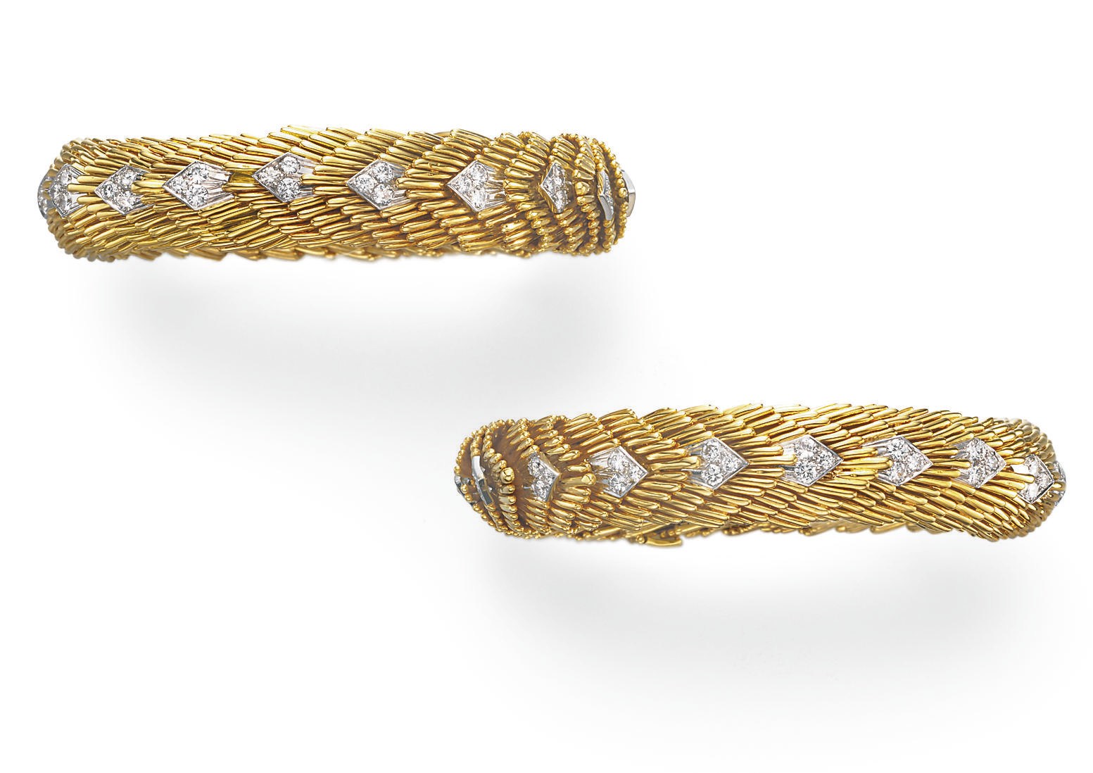 A PAIR OF DIAMOND AND GOLD BRACELETS, BY DAVID WEBB