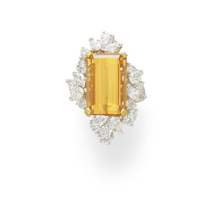 A TOPAZ AND DIAMOND RING, BY KURT WAYNE