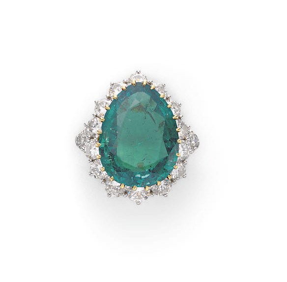 AN EMERALD AND DIAMOND RING