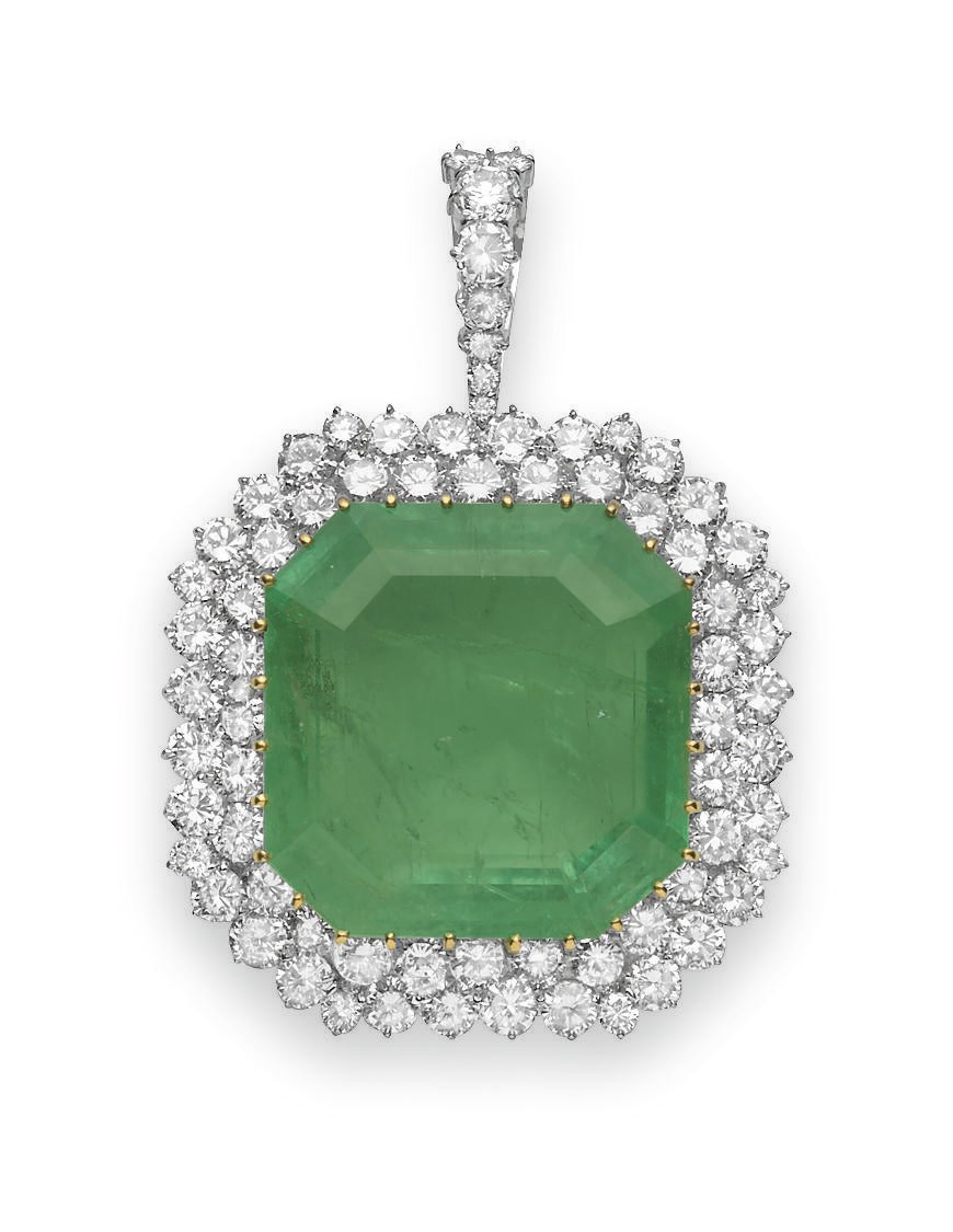 AN EMERALD AND DIAMOND PENDANT