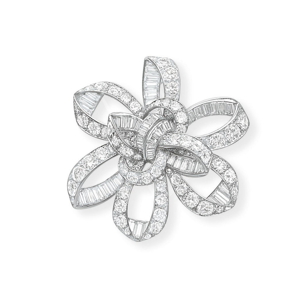 A STYLISH DIAMOND BROOCH, BY JOHN RUBEL