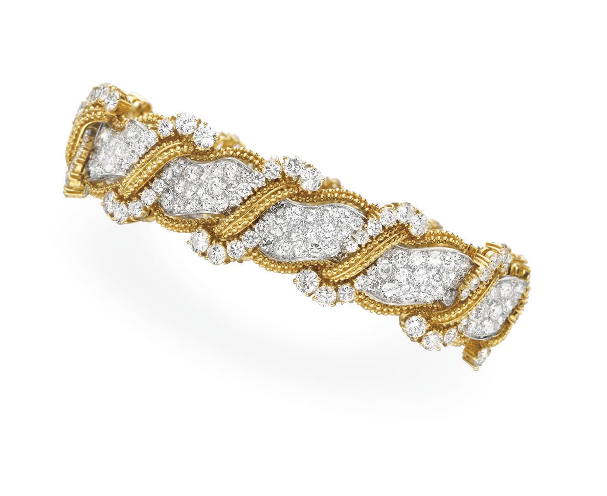 A DIAMOND AND GOLD BRACELET, BY HARRY WINSTON