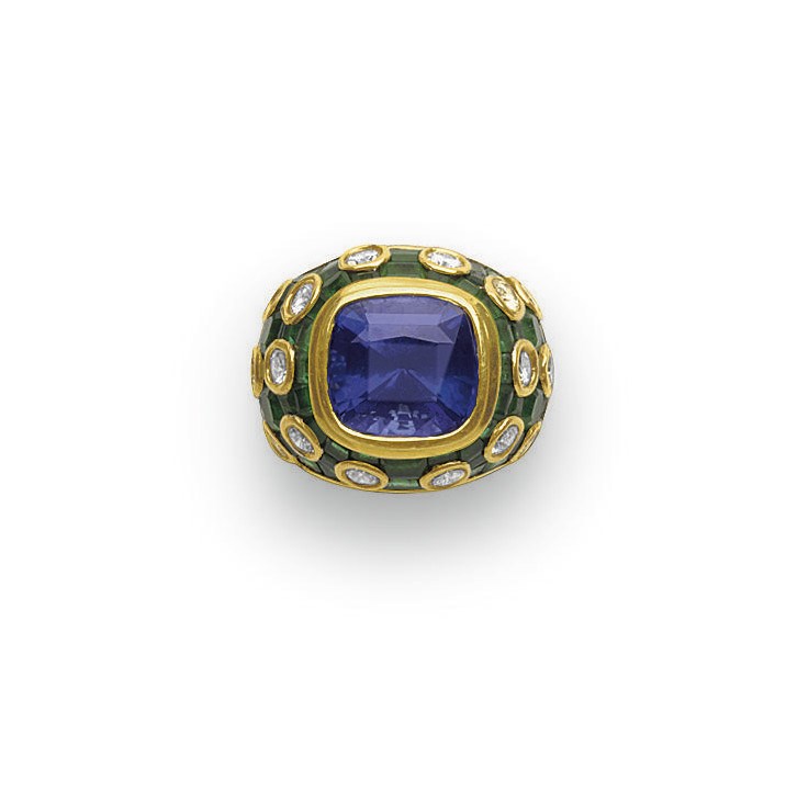 A TANZANITE, EMERALD AND DIAMOND RING