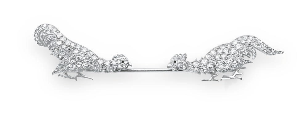 AN ART DECO DIAMOND JABOT PIN, BY CARTIER
