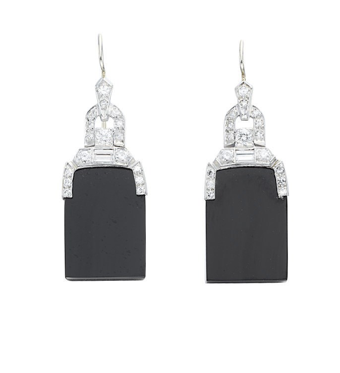 A PAIR OF ONYX AND DIAMOND EAR PENDANTS