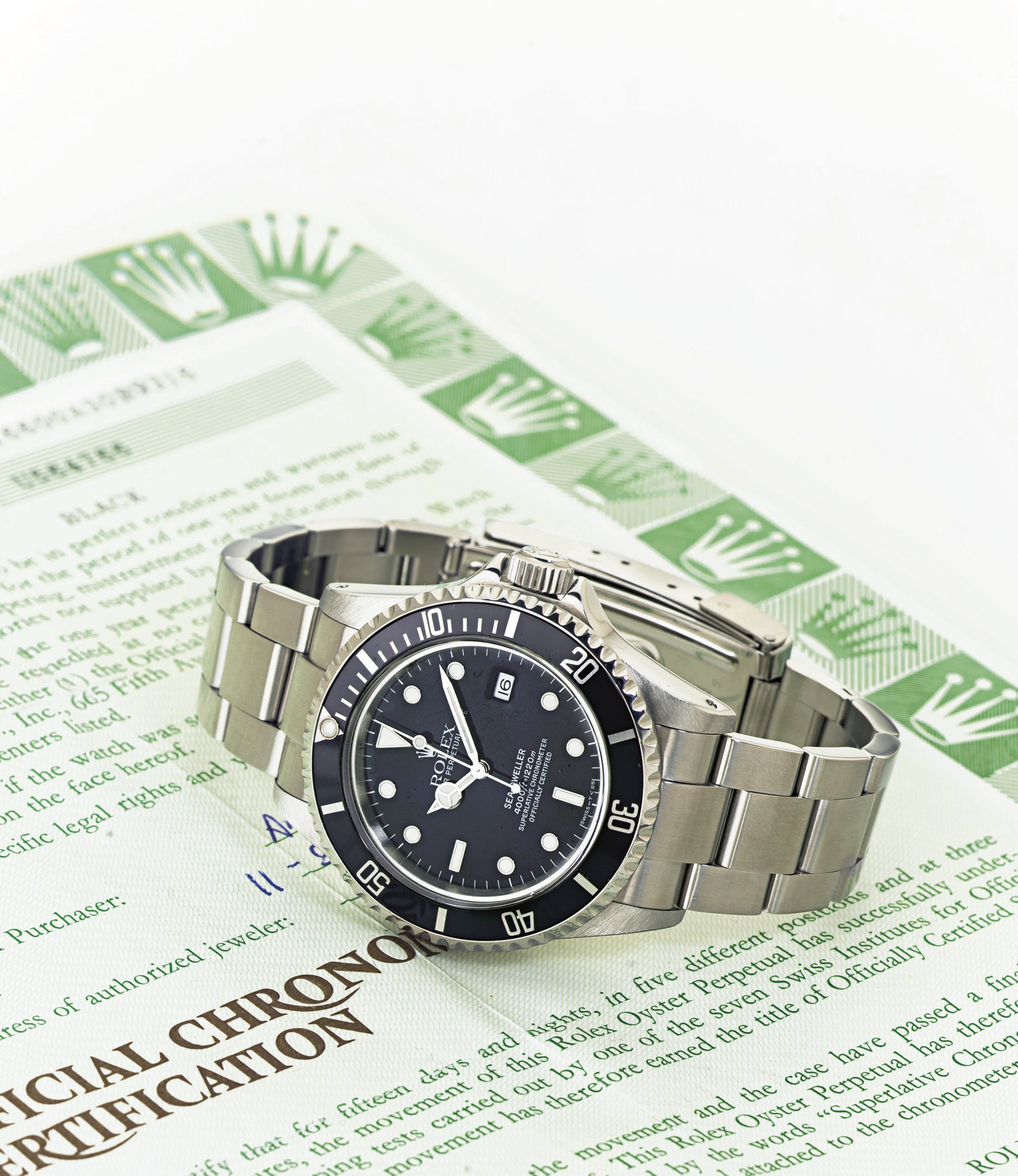 ROLEX.  A STAINLESS STEEL AUTOMATIC WRISTWATCH WITH DATE, CENTER SECONDS AND BRACELET