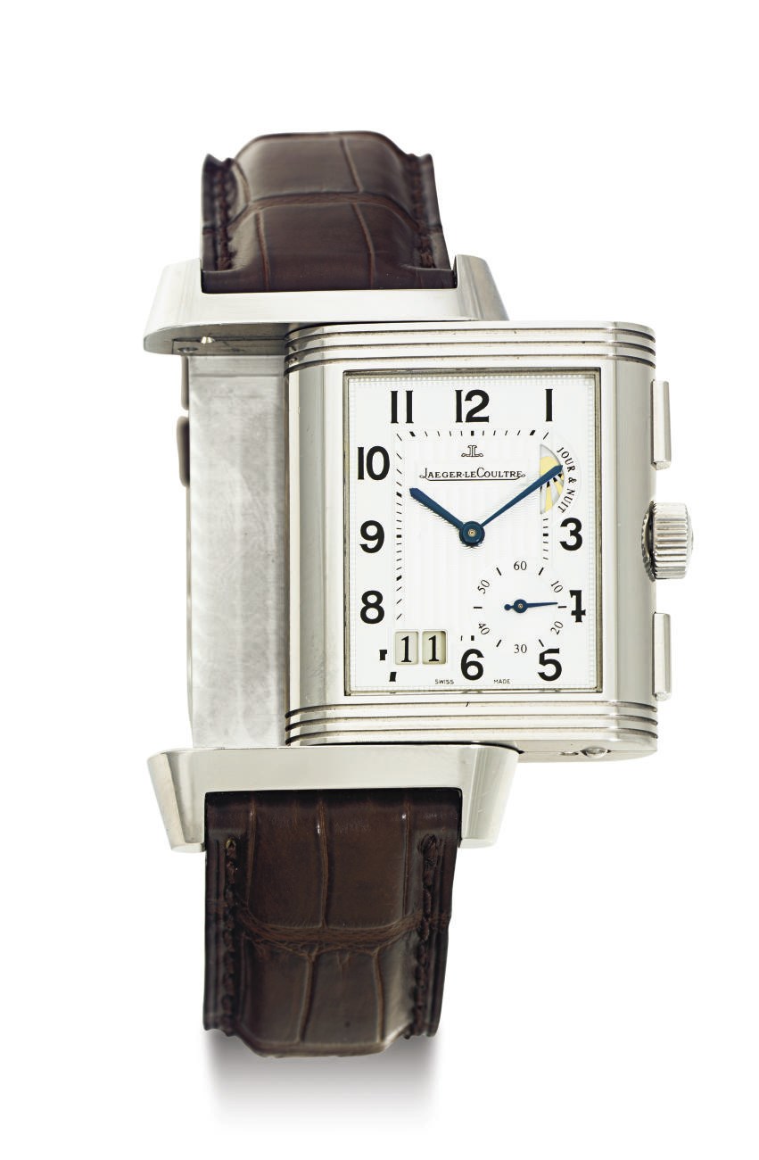JAEGER-LECOULTRE. A STAINLESS STEEL DUAL TIME WRISTWATCH WITH DATE, POWER RESERVE AND GMT