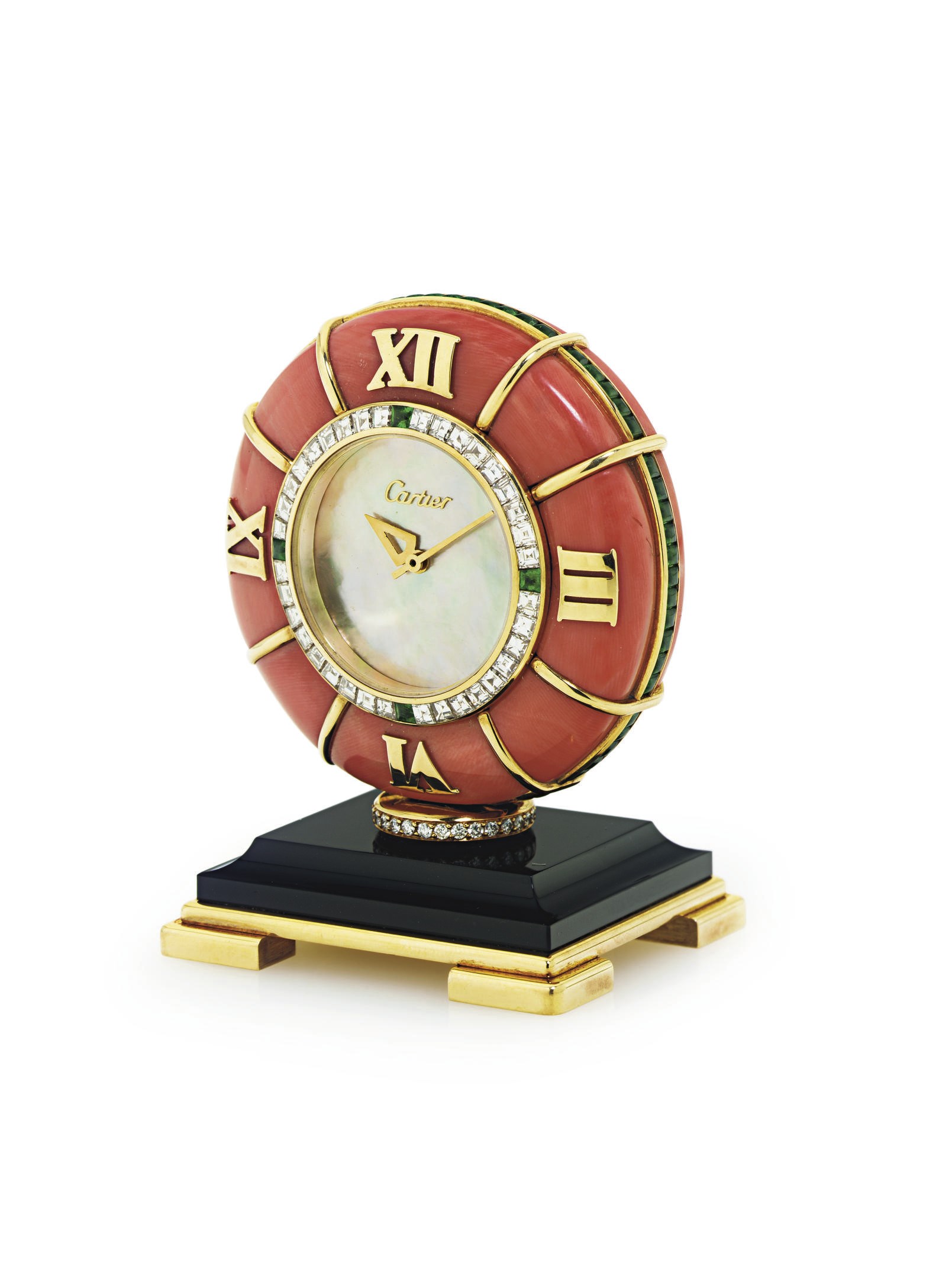 CARTIER. AN 18K GOLD, DIAMOND, EMERALD, CORAL, ONYX AND MOTHER-OF-PEARL DESK CLOCK