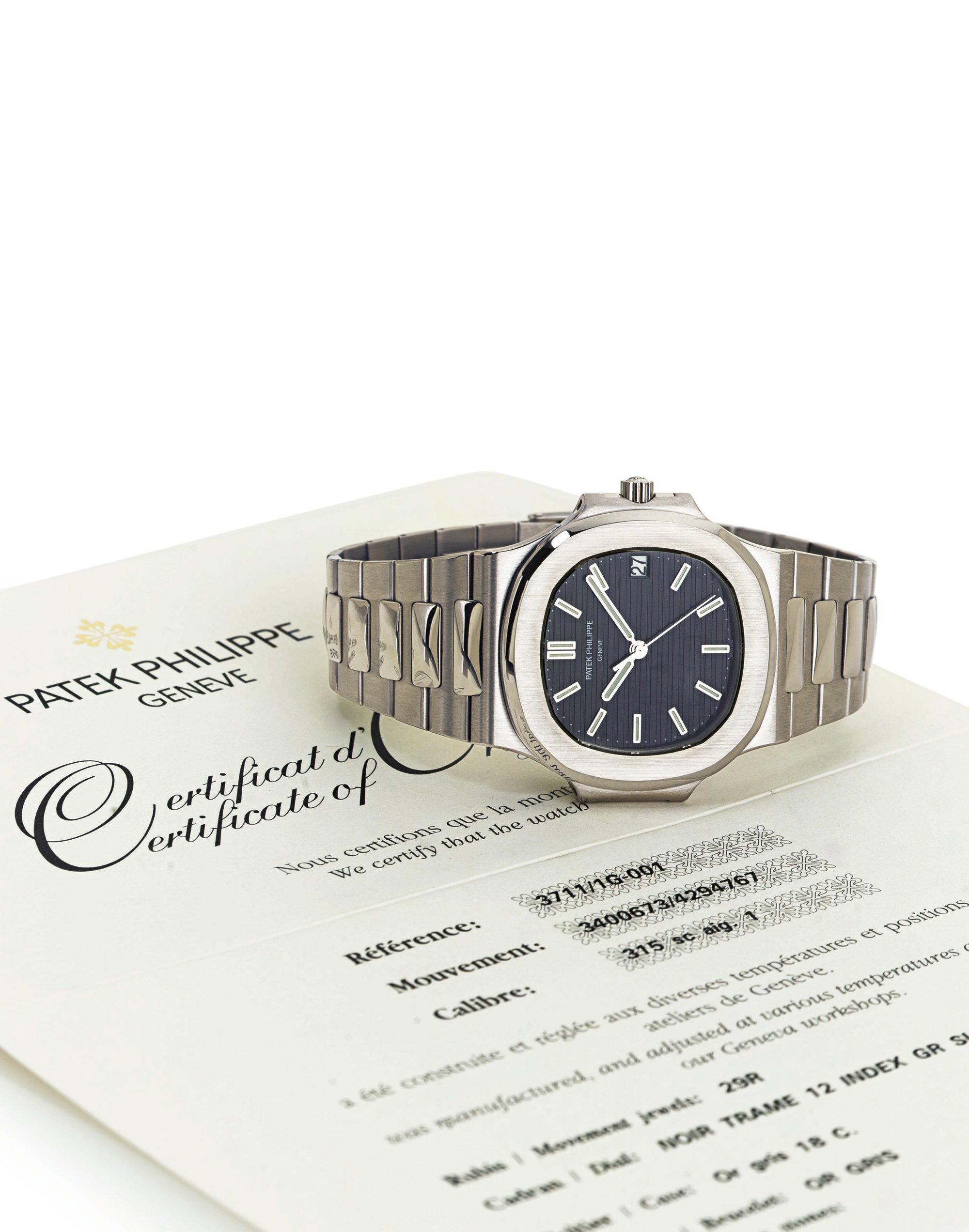 PATEK PHILIPPE.  AN 18K WHITE GOLD AUTOMATIC WRISTWATCH WITH DATE AND BRACELET