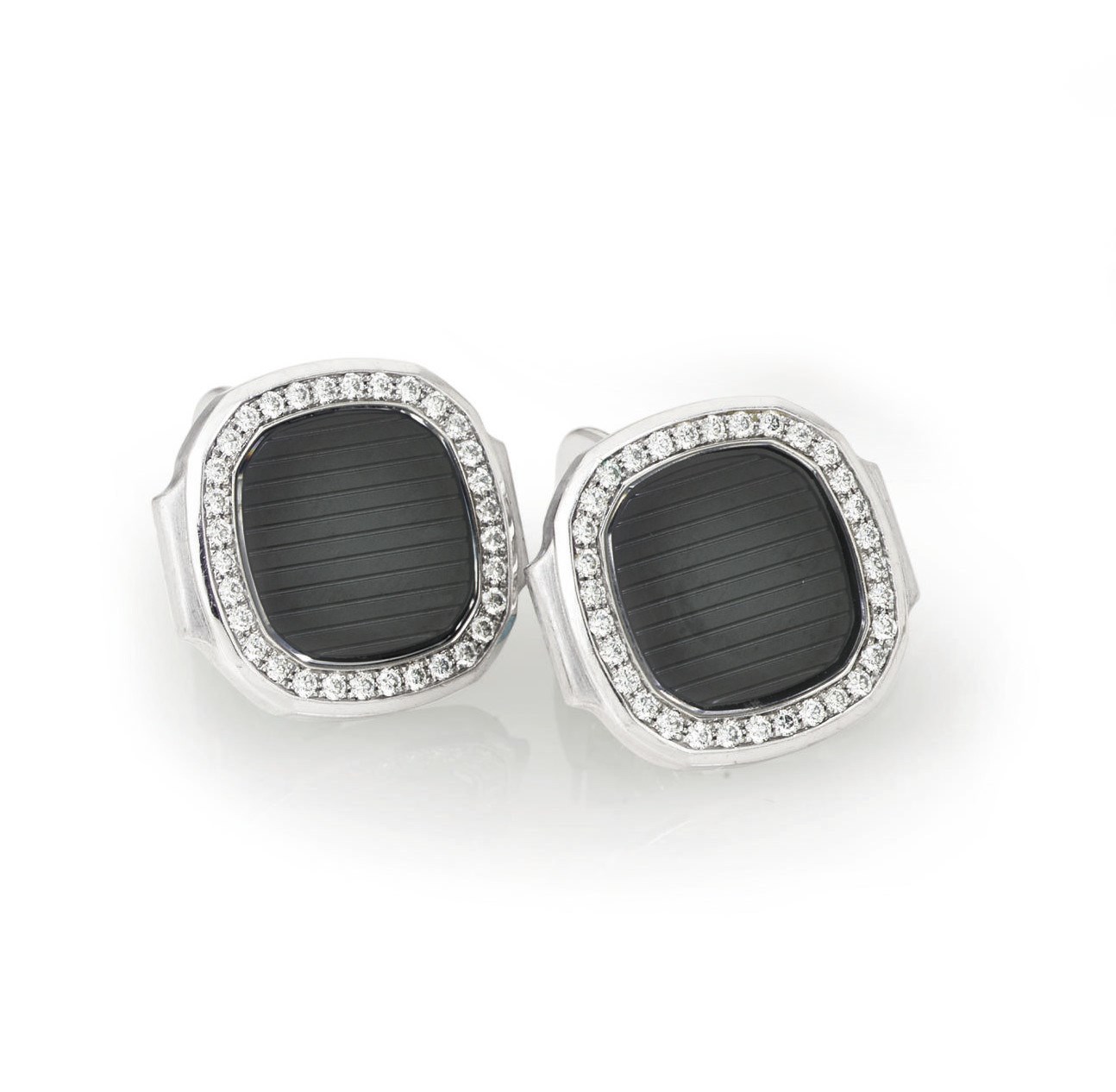 PATEK PHILIPPE. A PAIR OF 18K WHITE GOLD AND DIAMOND CUFFLINKS