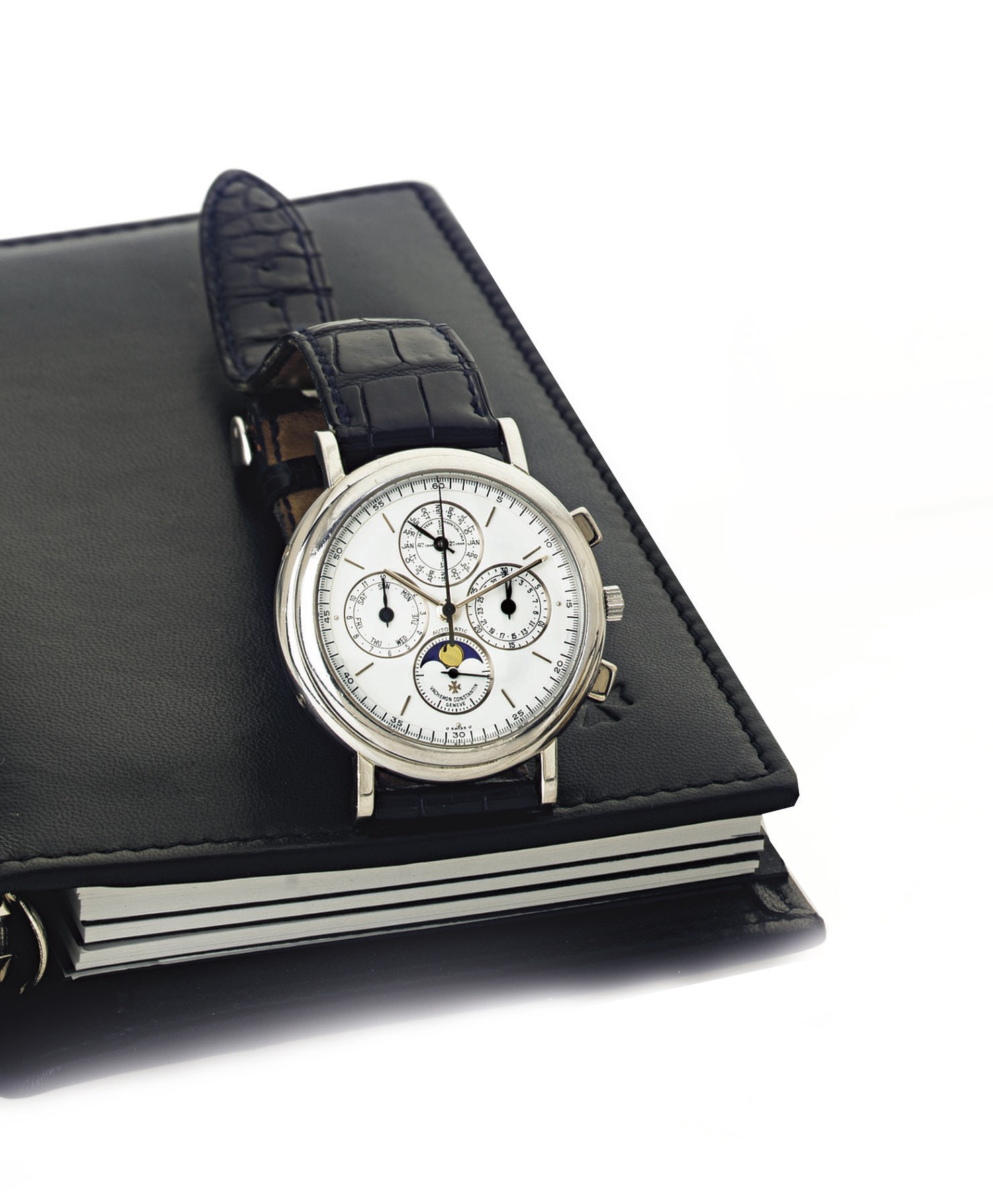 VACHERON CONSTANTIN.  A FINE PLATINUM AUTOMATIC PERPETUAL CALENDAR CHRONOGRAPH WRISTWATCH WITH MOON PHASES