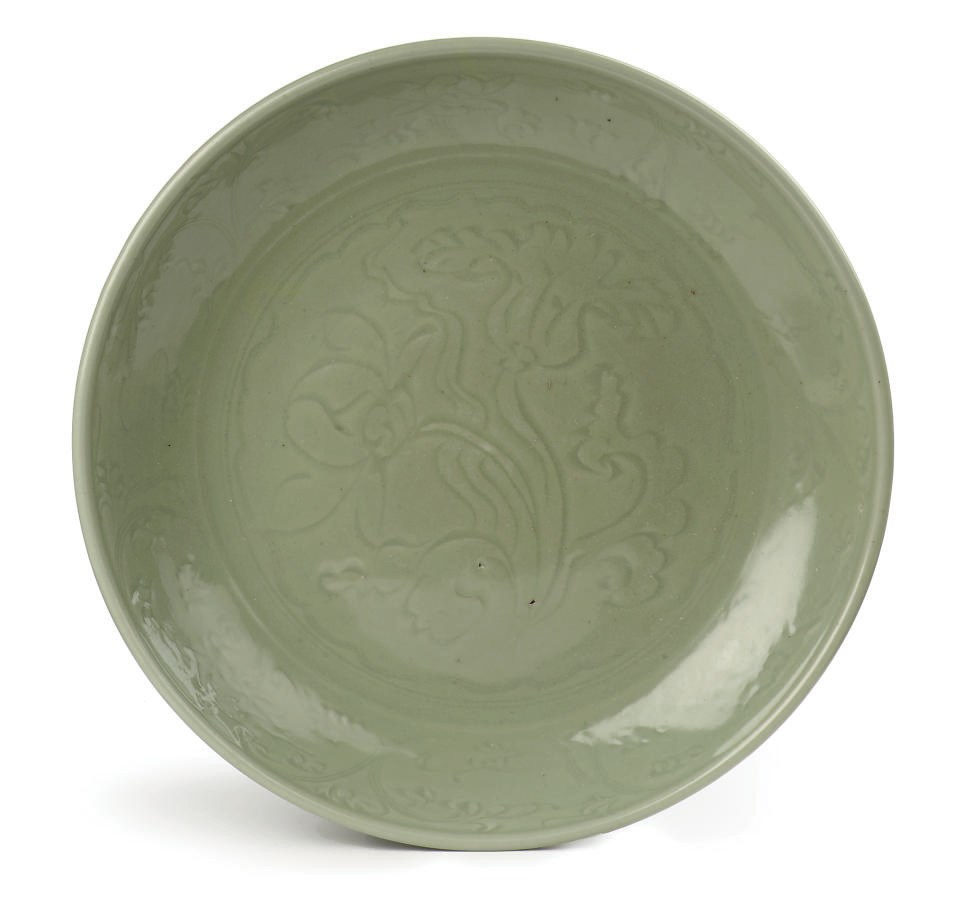 A Chinese early Ming celadon dish