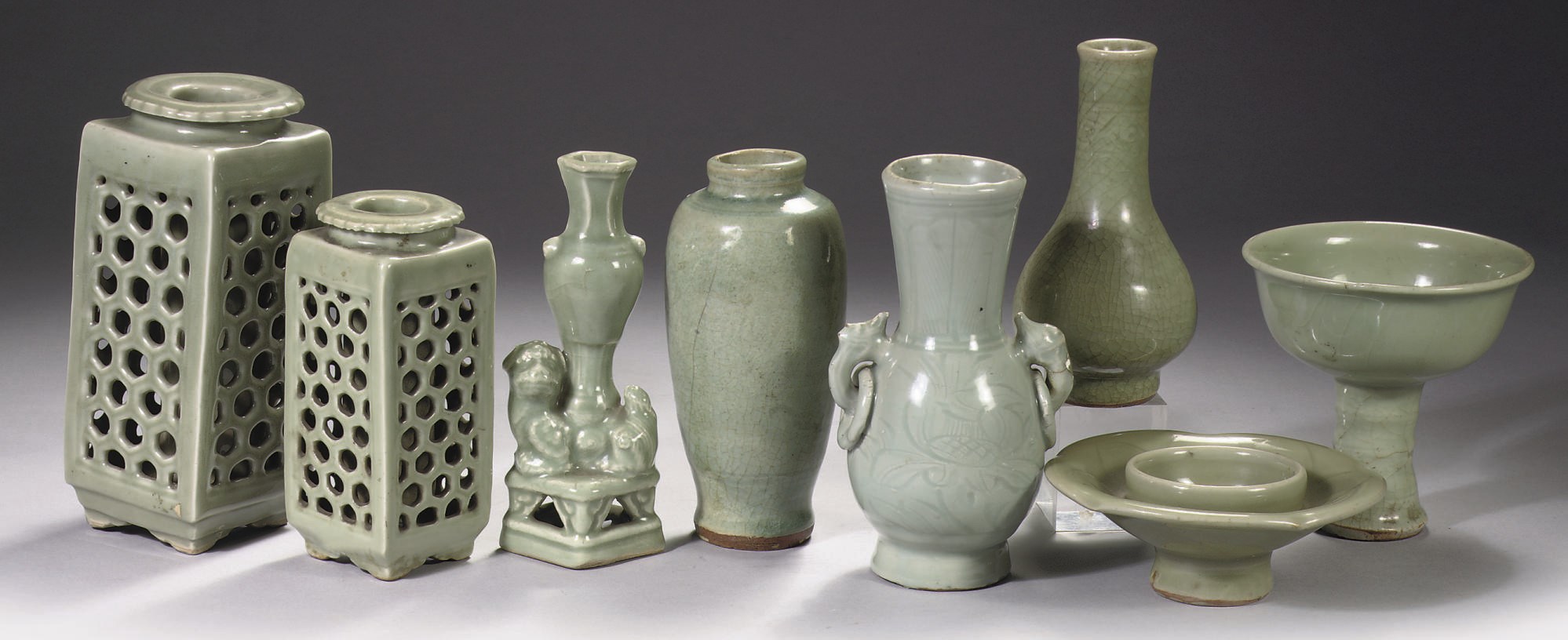 Six Chinese Longquan celadon vases, a stemcup and a cupstand