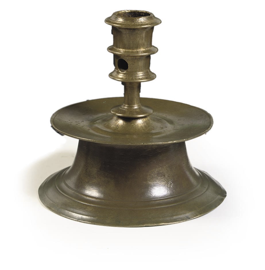 A BRASS SOCKET CANDLESTICK