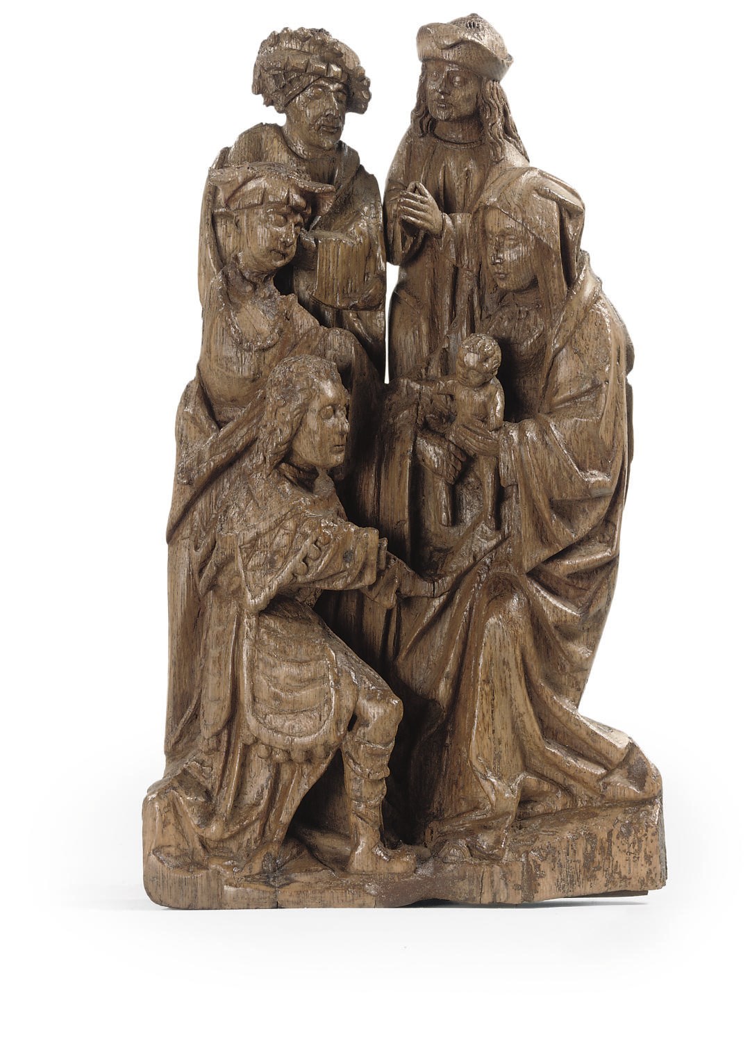 A CARVED OAK GROUP OF THE ADORATION OF THE MAGI