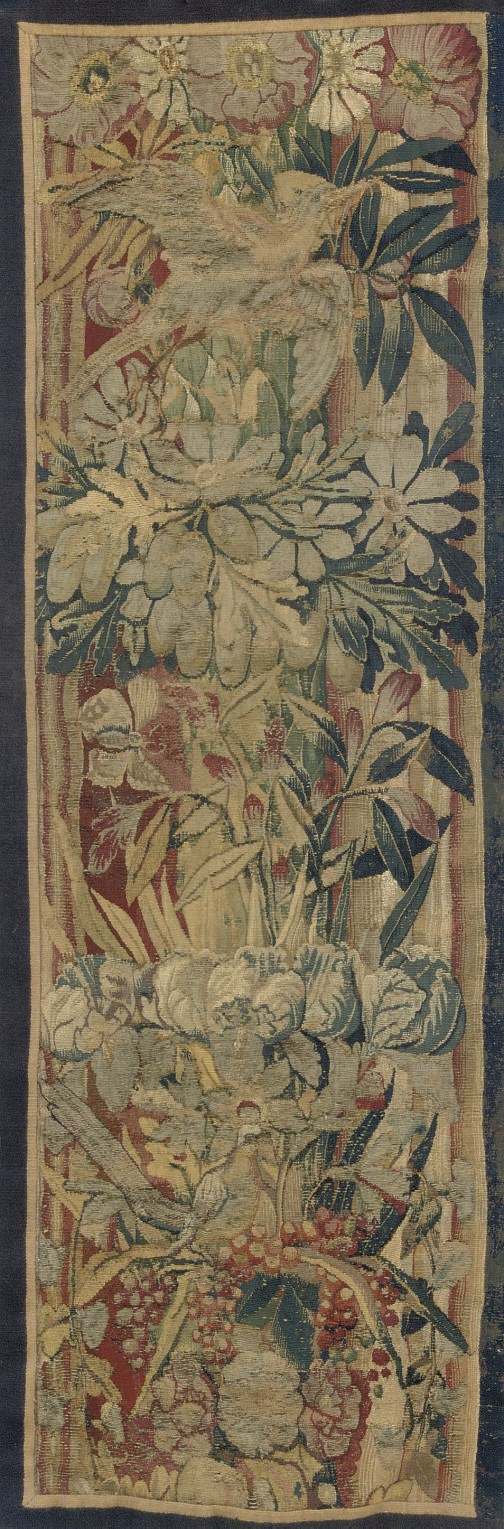 A FLEMISH TAPESTRY BORDER FRAGMENT