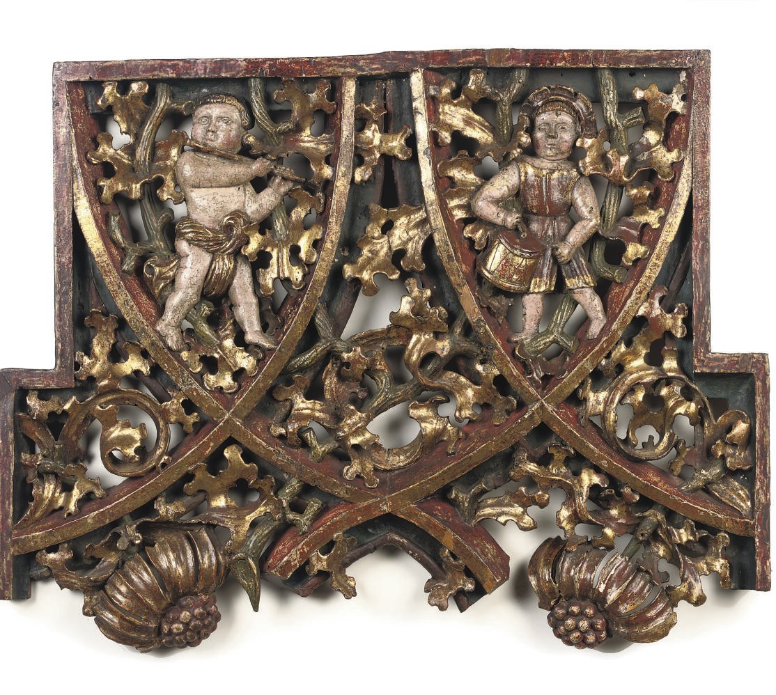 A POLYCHROME AND PARCEL-GILT CARVED LIMEWOOD RELIEF PANEL FROM AN ALTAR PIECE