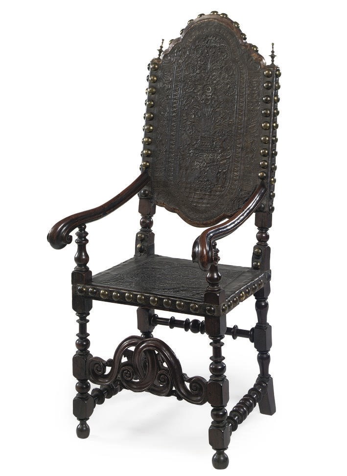 A PORTUGUESE ROSEWOOD, WALNUT AND CUIR CISELE ARMCHAIR