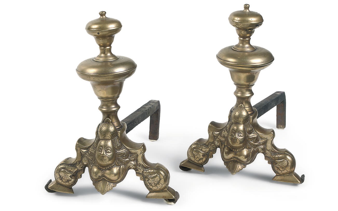 A PAIR OF DUTCH BRASS FIRE DOGS