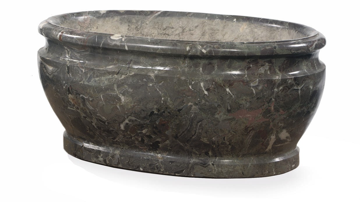 A VARIEGATED MARBLE WINE COOLER