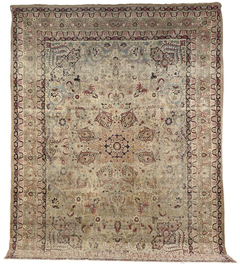 A KIRMAN LAVER CARPET