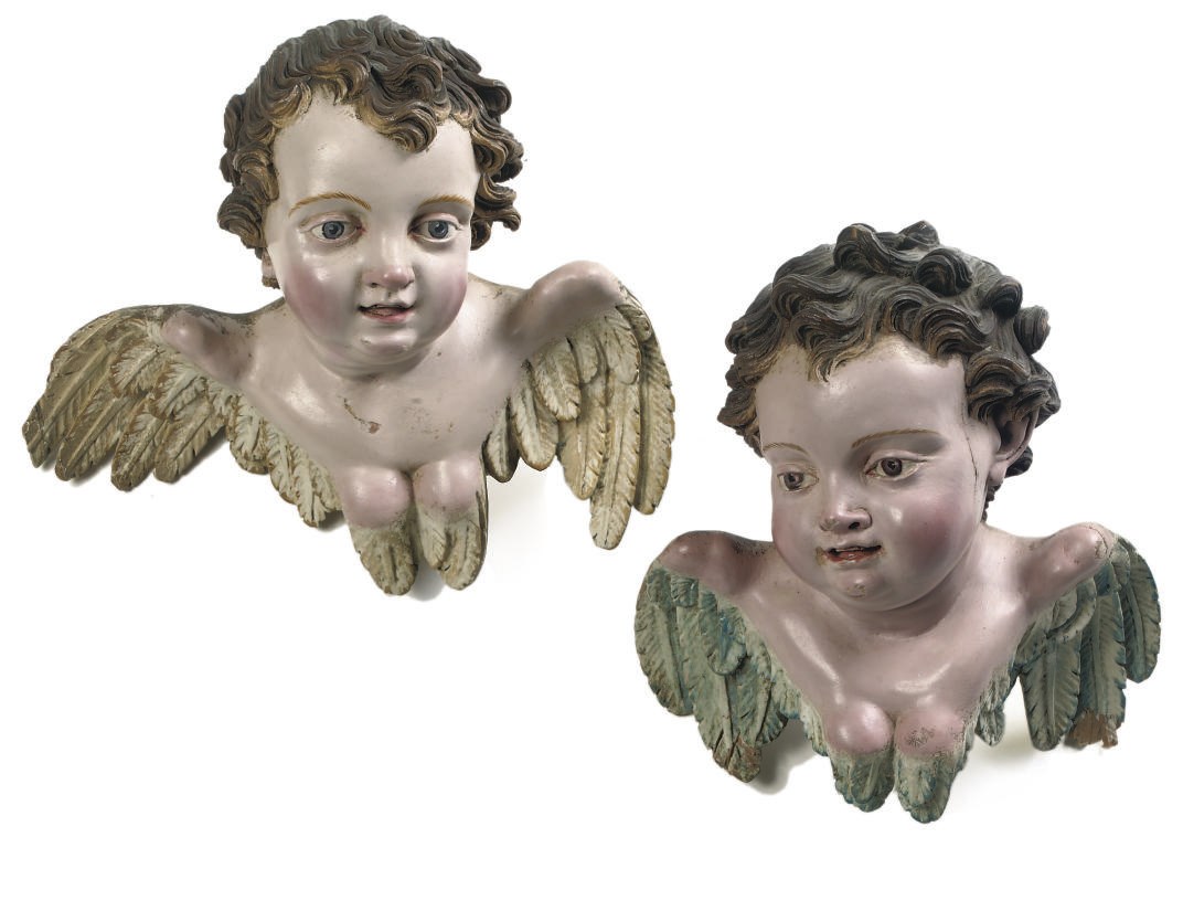 A PAIR OF POLYCHROME CARVED WOOD CHERUBS